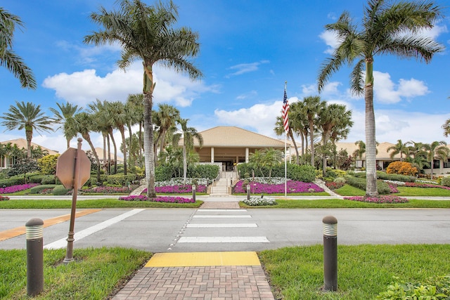 6 Stratford Dr E Unit D, Boynton Beach, FL 33436 - view of asphalt street featuring sidewalks and traffic signs