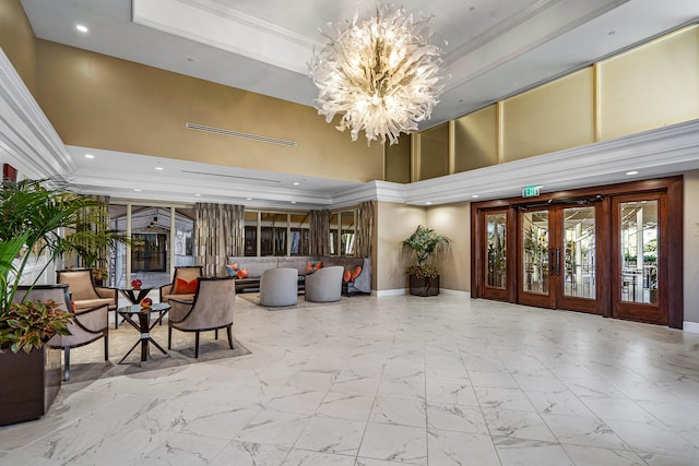 6 Stratford Dr E Unit D, Boynton Beach, FL 33436 - common area with a towering ceiling, ornamental molding, and recessed lighting