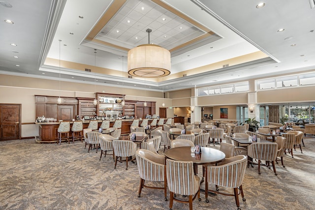 6 Stratford Dr E Unit D, Boynton Beach, FL 33436 - carpeted dining area with a raised ceiling, a high ceiling, ornamental molding, and recessed lighting