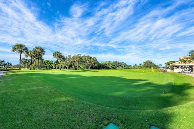 6 Stratford Dr E Unit D, Boynton Beach, FL 33436 - view of community with an area to practice putting, view of golf course, and a gazebo