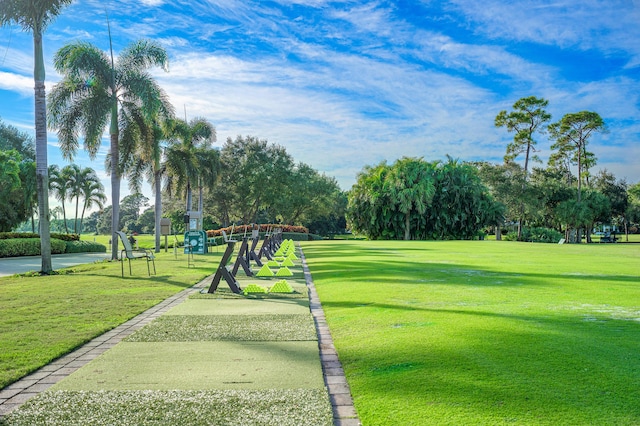 6 Stratford Dr E Unit D, Boynton Beach, FL 33436 - view of property's community featuring a yard and view of scattered trees