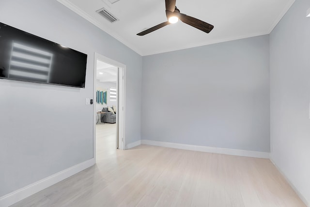 1511 S Palmway, Lake Worth Beach, FL 33460 - spare room with ceiling fan, wood finished floors, crown molding, and baseboards
