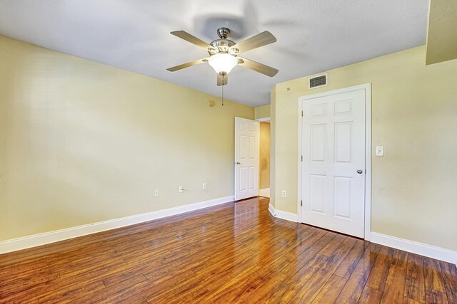 15035 Michelangelo Blvd Unit 106, Delray Beach, FL 33446 - unfurnished bedroom with wood finished floors, baseboards, and a ceiling fan