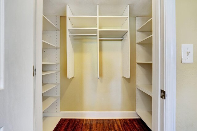 15035 Michelangelo Blvd Unit 106, Delray Beach, FL 33446 - spacious closet featuring wood finished floors