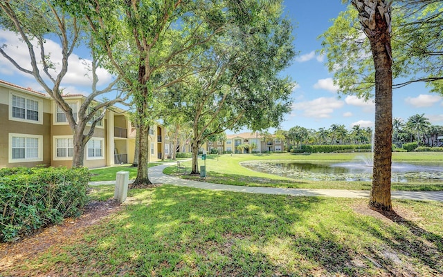 15035 Michelangelo Blvd Unit 106, Delray Beach, FL 33446 - view of green lawn with a water view