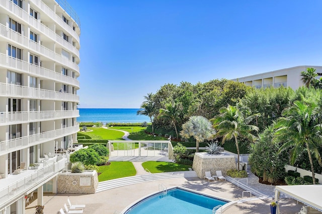 2780 S Ocean Blvd Unit 311, Palm Beach, FL 33480 - community pool featuring a water view and a patio