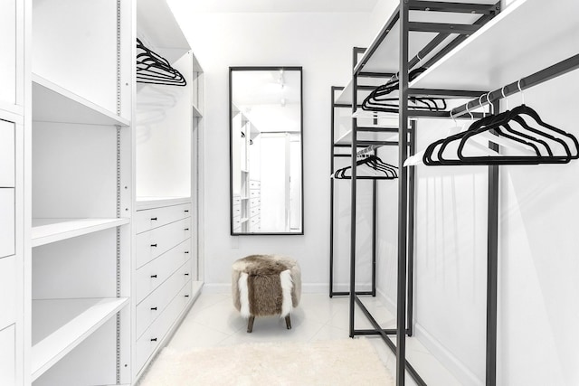 2780 S Ocean Blvd Unit 311, Palm Beach, FL 33480 - spacious closet featuring light tile patterned floors