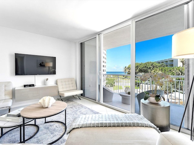 2780 S Ocean Blvd Unit 311, Palm Beach, FL 33480 - living room with a wall of windows and a water view