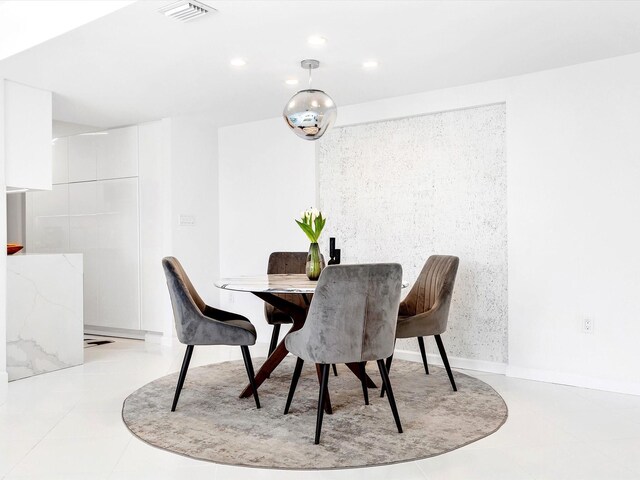 2780 S Ocean Blvd Unit 311, Palm Beach, FL 33480 - tiled dining space with recessed lighting
