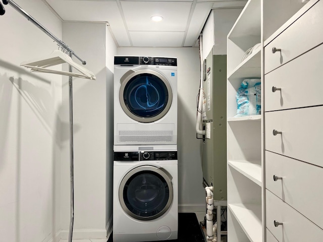 2780 S Ocean Blvd Unit 311, Palm Beach, FL 33480 - clothes washing area featuring stacked washer and clothes dryer