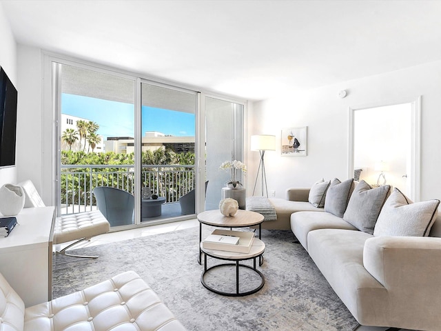 2780 S Ocean Blvd Unit 311, Palm Beach, FL 33480 - living room featuring floor to ceiling windows