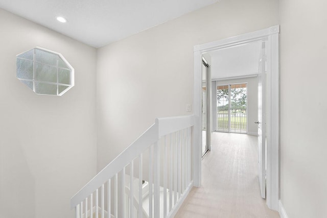 122 Ashley Ct, Jupiter, FL 33458 - hallway featuring an upstairs landing and recessed lighting