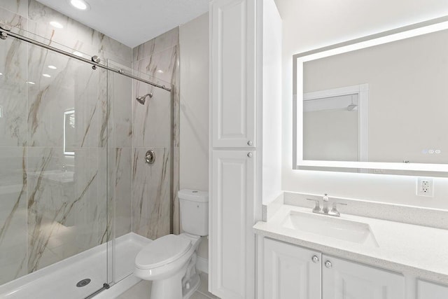 122 Ashley Ct, Jupiter, FL 33458 - full bath with toilet, a marble finish shower, and vanity