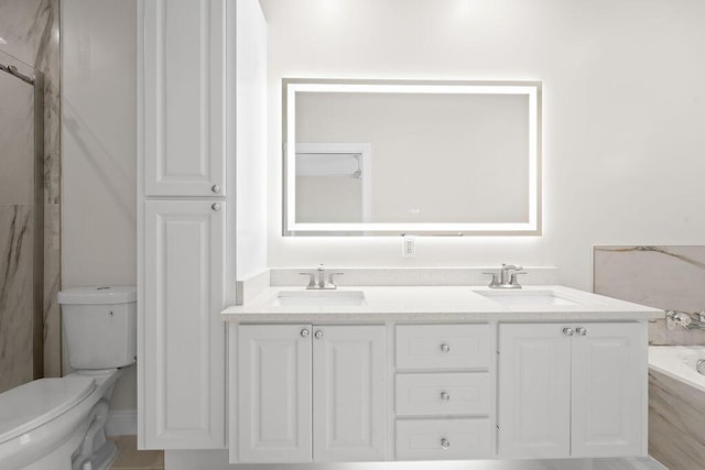 122 Ashley Ct, Jupiter, FL 33458 - full bath with toilet, double vanity, and a tub to relax in