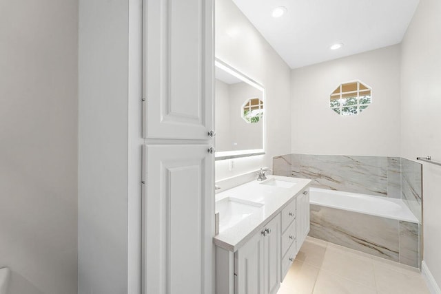 122 Ashley Ct, Jupiter, FL 33458 - full bath featuring a garden tub, tile patterned flooring, double vanity, and recessed lighting