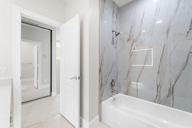 122 Ashley Ct, Jupiter, FL 33458 - full bathroom with shower / bathtub combination, baseboards, and tile patterned flooring