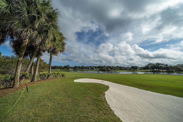 122 Ashley Ct, Jupiter, FL 33458 - view of home's community featuring a water view, a yard, and golf course view