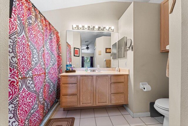 2389 SW Caballero St, Port Saint Lucie, FL 34953 - full bath featuring tile patterned floors, toilet, vanity, a ceiling fan, and a shower with curtain