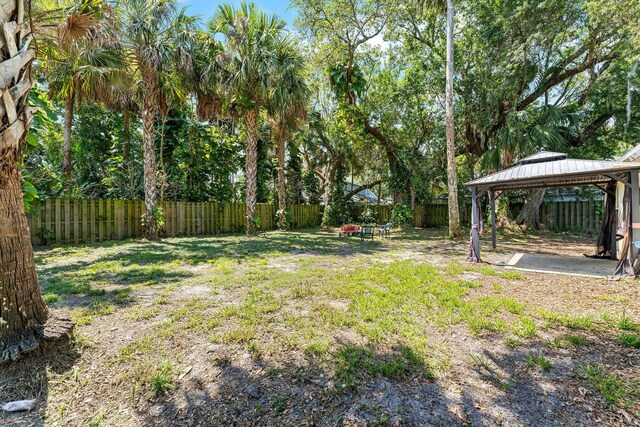 2389 SW Caballero St, Port Saint Lucie, FL 34953 - view of yard featuring a gazebo and a carport