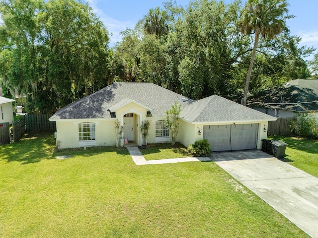 2389 SW Caballero St, Port Saint Lucie, FL 34953 - ranch-style house featuring a garage, roof with shingles, driveway, and stucco siding