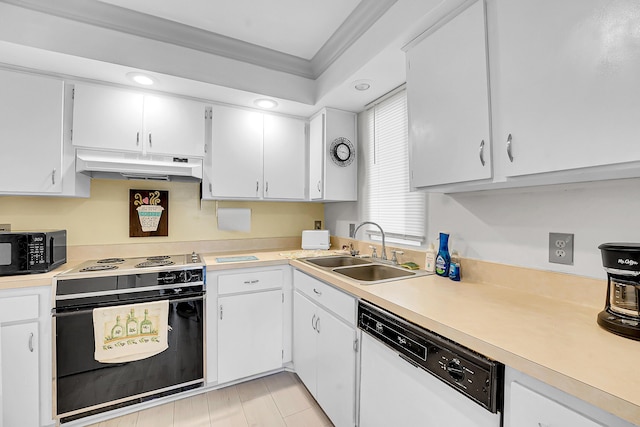 1673 SE Green Acres Cir Unit Nn-202, Port Saint Lucie, FL 34952 - kitchen featuring under cabinet range hood, black appliances, a sink, light countertops, and white cabinetry