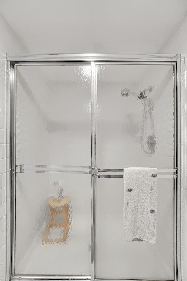 1673 SE Green Acres Cir Unit Nn-202, Port Saint Lucie, FL 34952 - bathroom featuring a shower stall