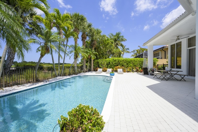 157 Esperanza Way, Palm Beach Gardens, FL 33418 - view of swimming pool featuring ceiling fan and a patio area