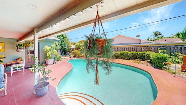 1630 40th St, West Palm Beach, FL 33407 - swimming pool with a fenced backyard and a patio area