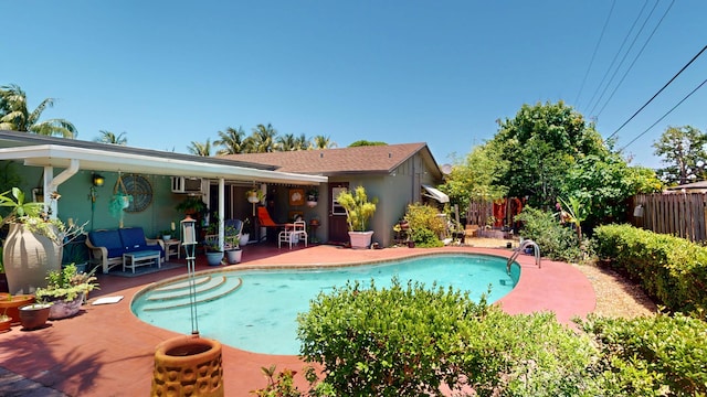 1630 40th St, West Palm Beach, FL 33407 - view of pool featuring a patio area and a fenced backyard