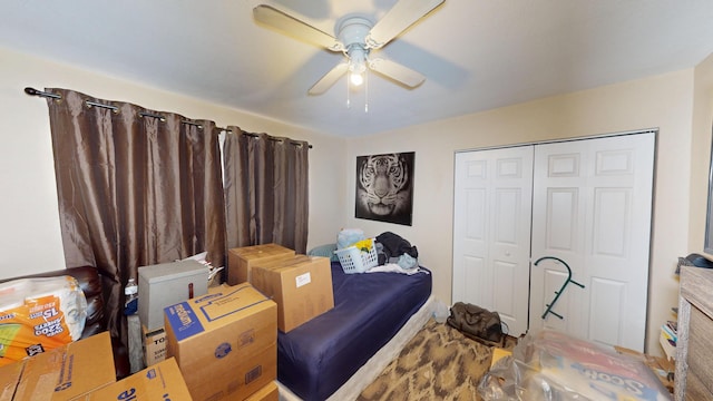 bedroom with a closet and ceiling fan