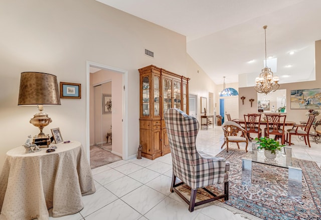 7043 Summer Tree Dr, Boynton Beach, FL 33437 - living area featuring a chandelier, lofted ceiling, and baseboards