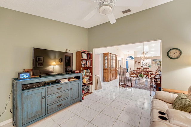 7043 Summer Tree Dr, Boynton Beach, FL 33437 - living area with a ceiling fan and a chandelier