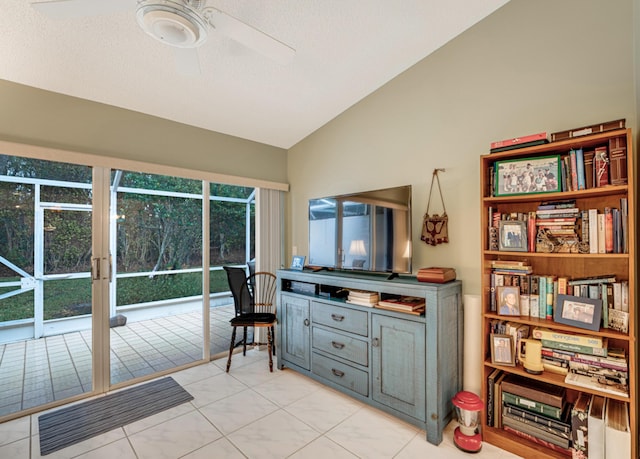7043 Summer Tree Dr, Boynton Beach, FL 33437 - living area with vaulted ceiling, a ceiling fan, and tile patterned flooring
