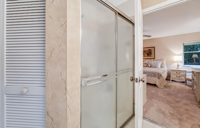 7043 Summer Tree Dr, Boynton Beach, FL 33437 - ensuite bathroom with a stall shower and tile patterned floors