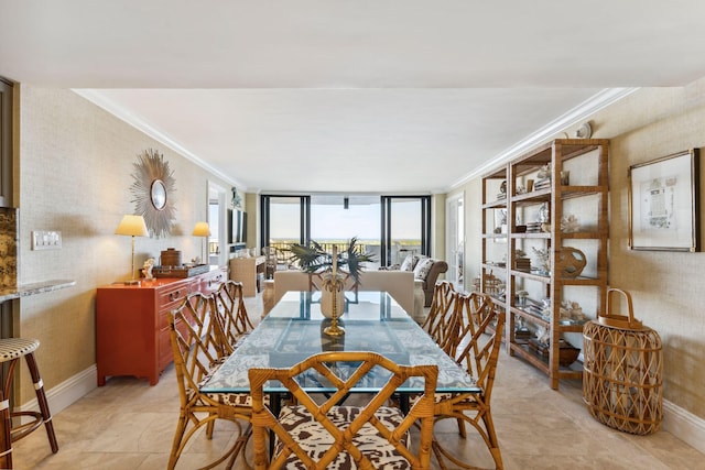1200 S Flagler Dr Unit 1402, West Palm Beach, FL 33401 - dining room with crown molding, expansive windows, and baseboards