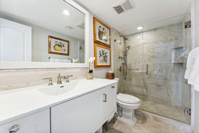 1200 S Flagler Dr Unit 1402, West Palm Beach, FL 33401 - full bath with a stall shower, toilet, recessed lighting, vanity, and decorative backsplash