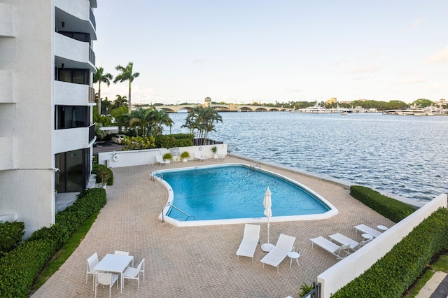 1200 S Flagler Dr Unit 1402, West Palm Beach, FL 33401 - community pool with a water view and a patio area