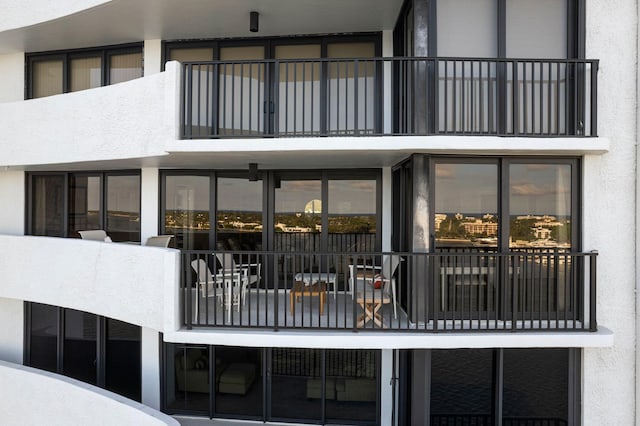1200 S Flagler Dr Unit 1402, West Palm Beach, FL 33401 - rear view of house featuring a balcony and stucco siding