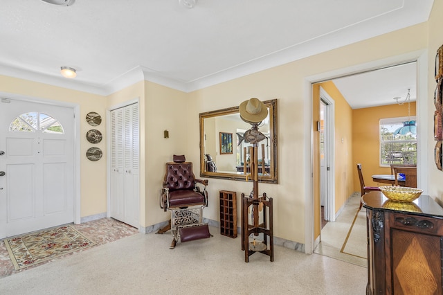 1101 SE 7th Ct, Deerfield Beach, FL 33441 - foyer entrance featuring baseboards and dark aggregate flooring