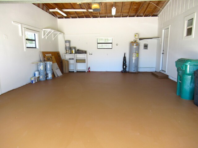 5310 Palm Dr, Fort Pierce, FL 34982 - garage with water heater and a garage door opener