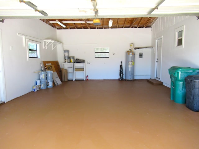 5310 Palm Dr, Fort Pierce, FL 34982 - garage with water heater and a garage door opener