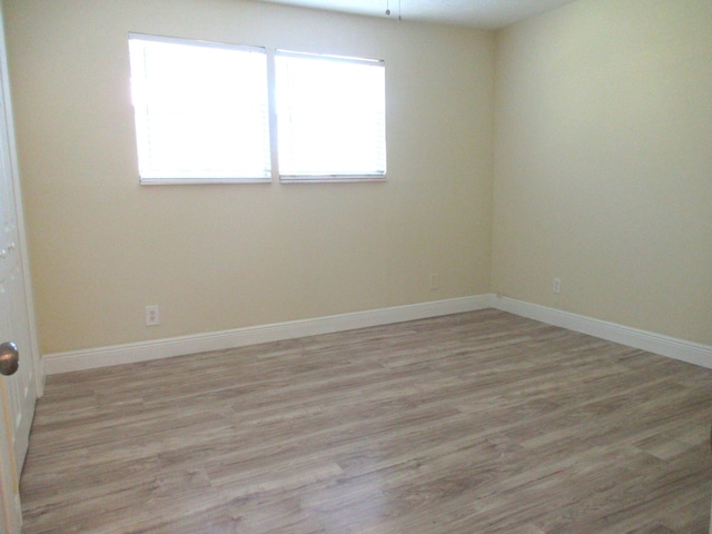 5310 Palm Dr, Fort Pierce, FL 34982 - unfurnished room featuring light wood finished floors and baseboards