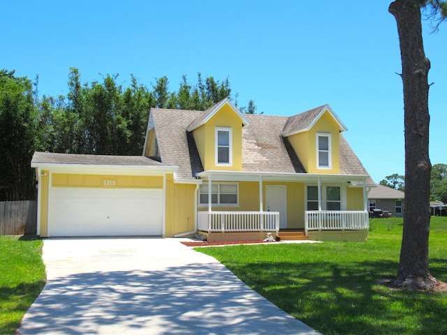 5310 Palm Dr, Fort Pierce, FL 34982 - view of front of home with a garage, a porch, driveway, a front yard, and roof with shingles