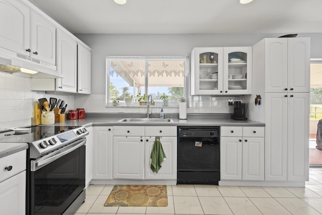 2008 SE Triumph Rd, Port Saint Lucie, FL 34952 - kitchen with dishwasher, electric stove, a sink, decorative backsplash, and under cabinet range hood