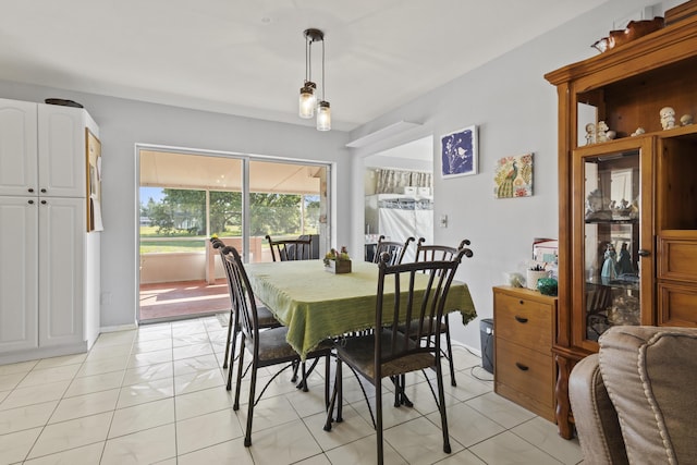 2008 SE Triumph Rd, Port Saint Lucie, FL 34952 - dining room featuring light tile patterned floors