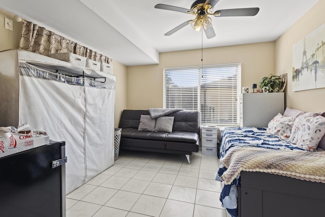 2008 SE Triumph Rd, Port Saint Lucie, FL 34952 - bedroom with light tile patterned flooring and ceiling fan
