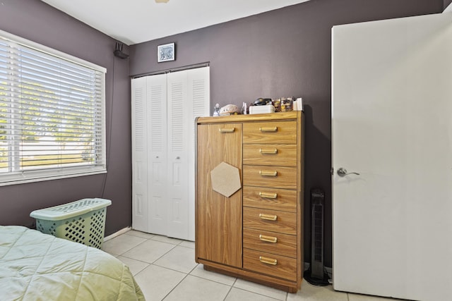 2008 SE Triumph Rd, Port Saint Lucie, FL 34952 - bedroom with light tile patterned floors and a closet