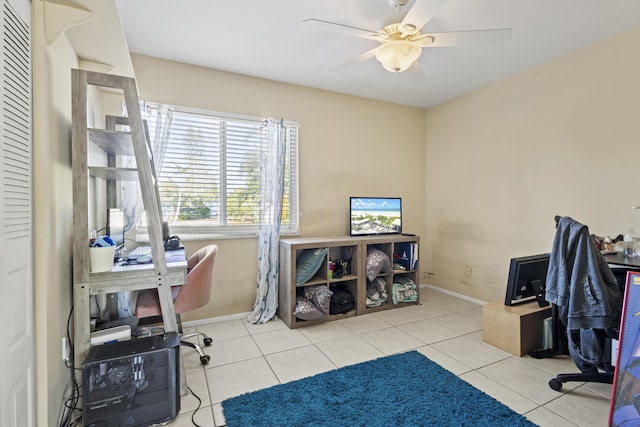 2008 SE Triumph Rd, Port Saint Lucie, FL 34952 - office with tile patterned floors, a ceiling fan, and baseboards