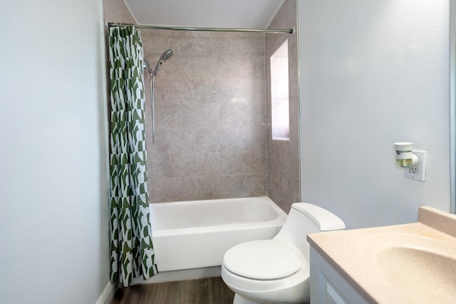 bathroom featuring shower / bath combo with shower curtain, vanity, wood finished floors, and toilet