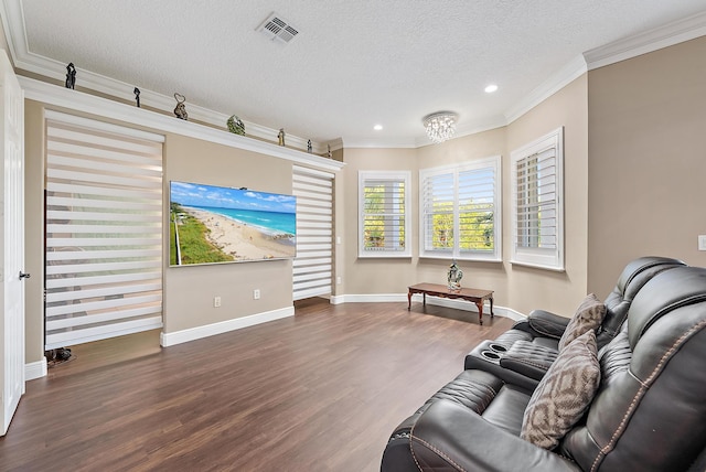 9606 Shepard Pl, Wellington, FL 33414 - living room with wood finished floors, recessed lighting, a textured ceiling, crown molding, and baseboards